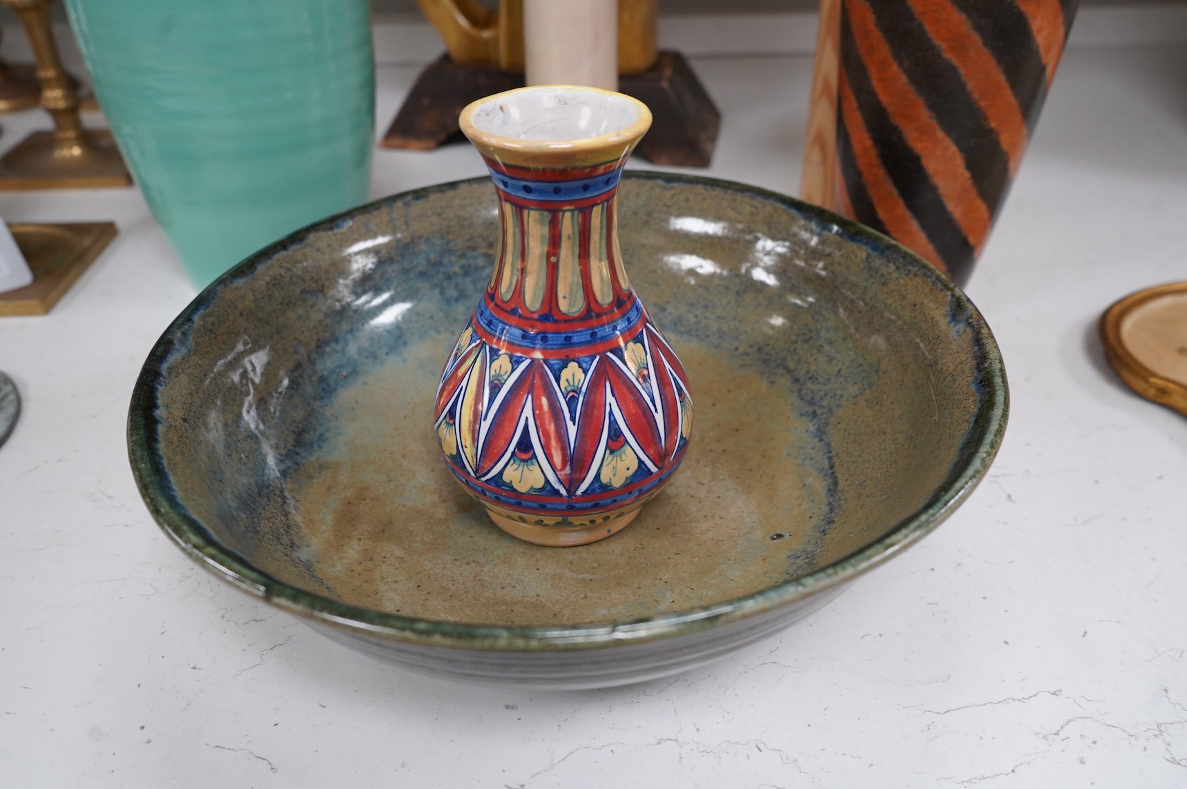 A collection of ceramics to include a Poole turquoise vase, modernist elephant and Santo Stefano di Camastra vase, largest 37cm high